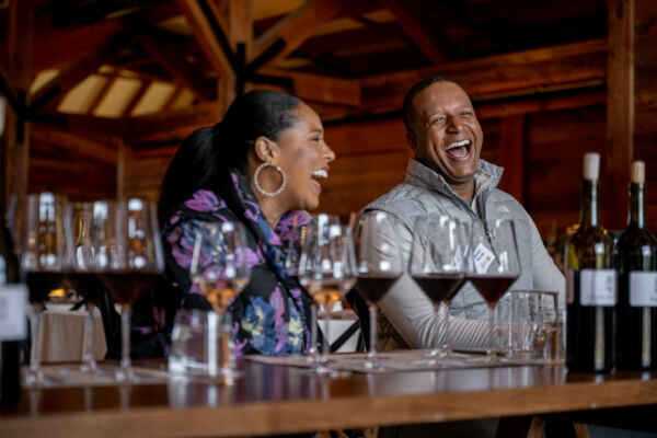 2 people laughing inside the event space in Bricoleur vineyard