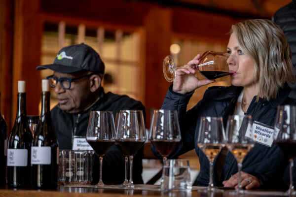 2 People drinking wine in a corporate meeting event venue